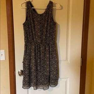 Navy and tan mid thigh dress.